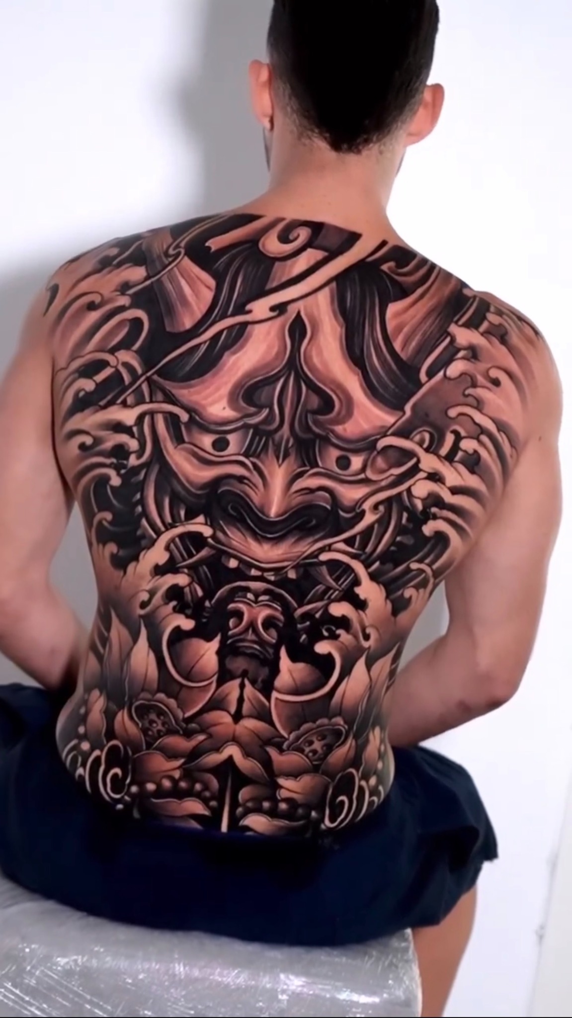 Full back — Japanese mask and waves
