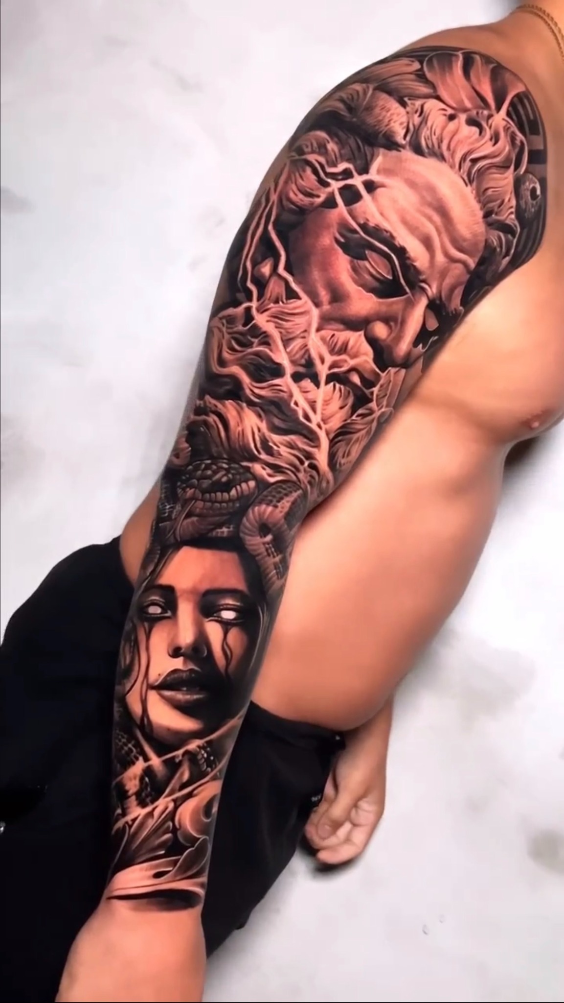 Black and grey arm piece